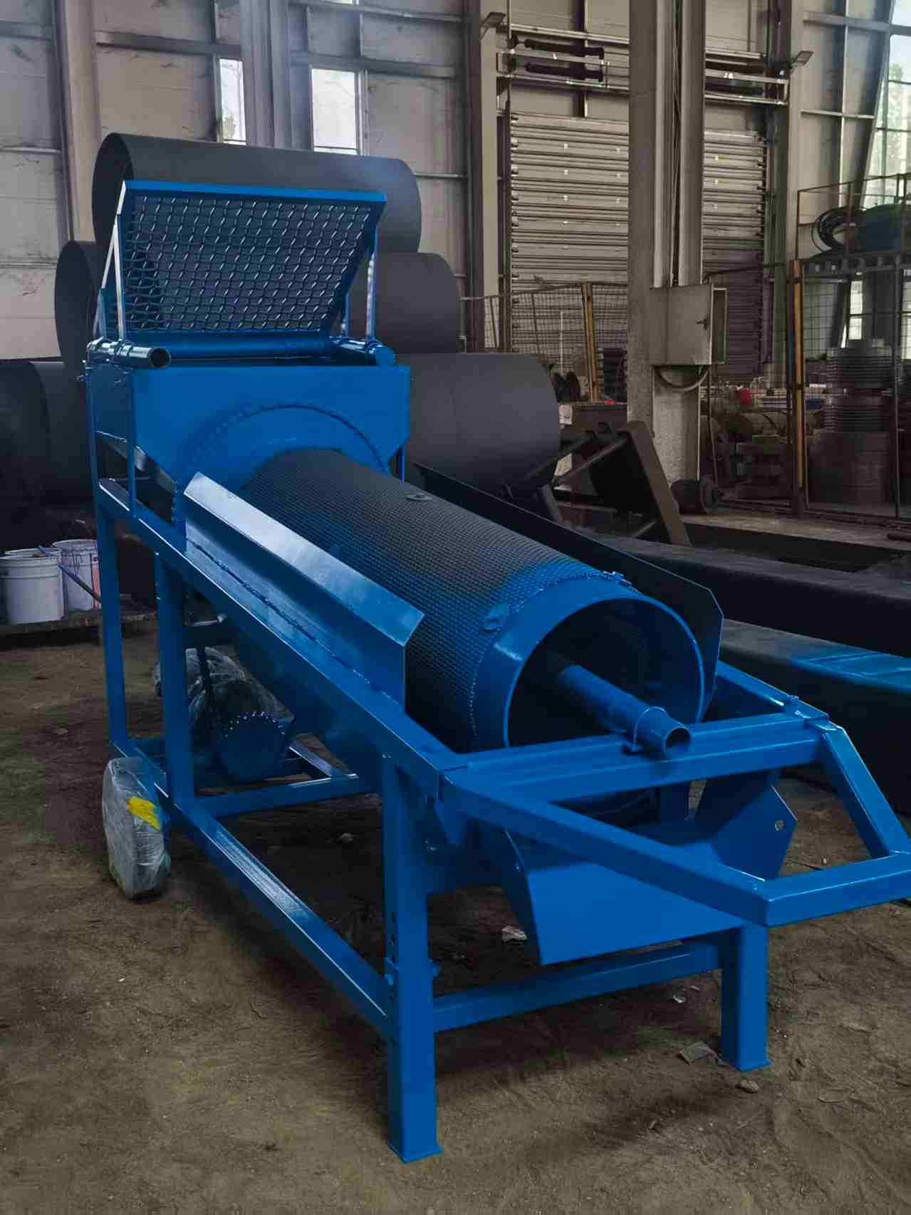 Tombereau vibrant (trommel)